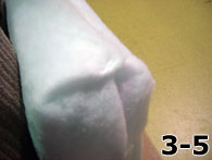 Dacron Wrapped Foam Showing Folded and Stapled Dacron